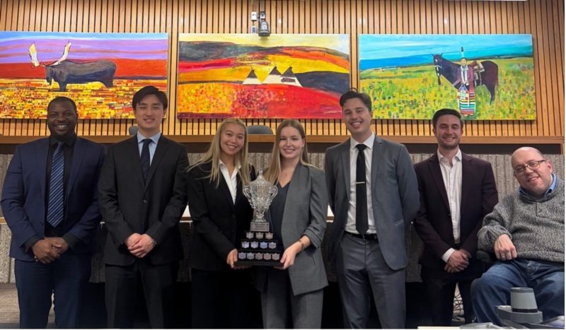 Pictured from left to right: Michael Badejo (Fillmore Riley), William Ho (1L), Meagan Gillis (1L), Linnea Kosokowsky (1L), Eric Wagner (1L), Nick Noonan (Fillmore Riley), and Professor Darcy MacPherson.